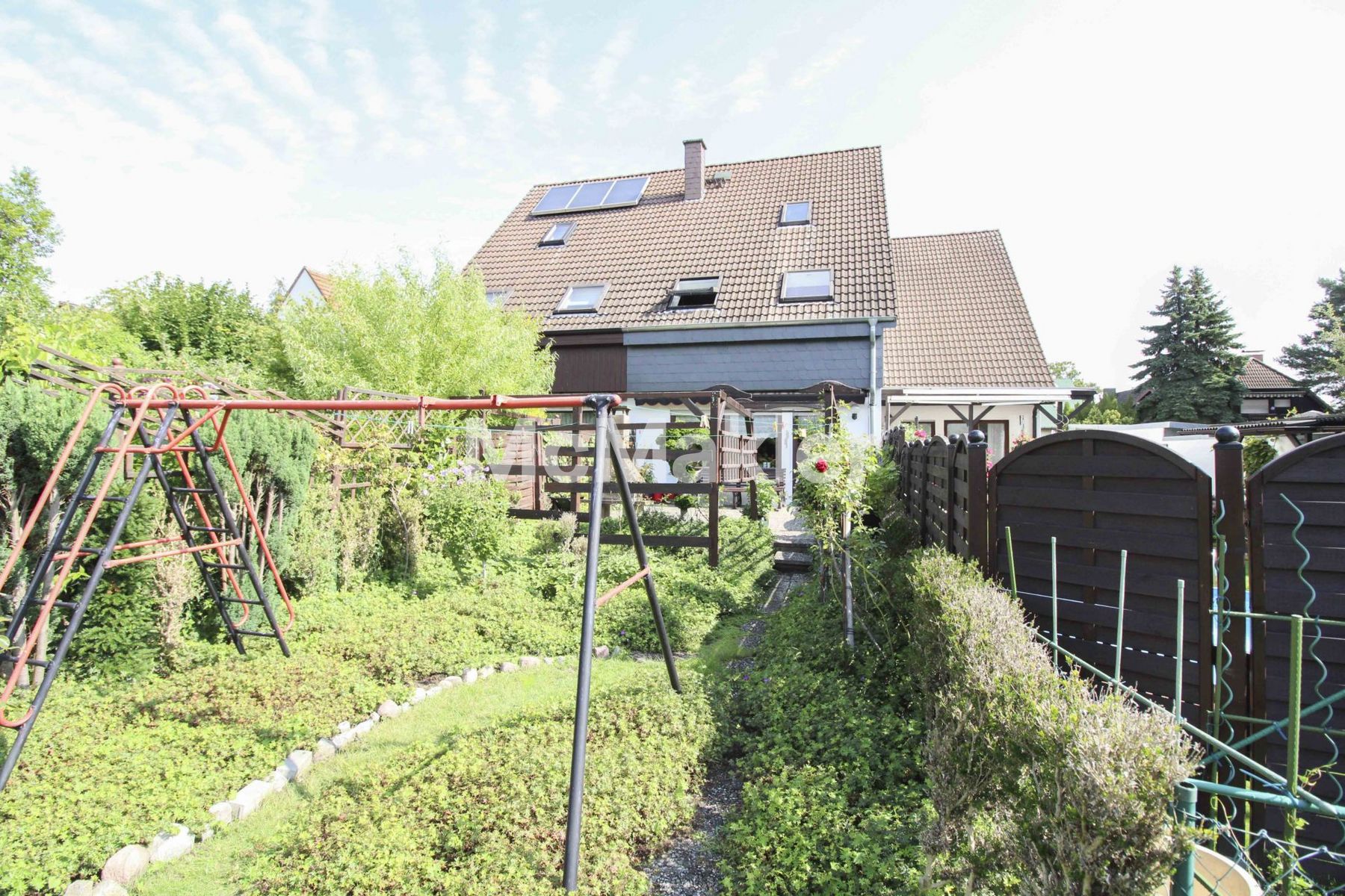 Familienglück in Berlin-Buckow – Großzügiges Reihenmittelhaus mit Terrasse, Garten und Stellplatz