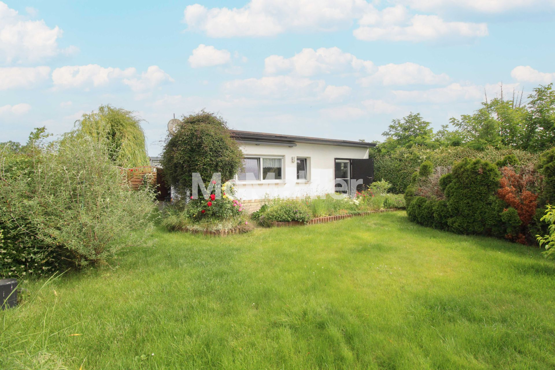 Erste Reihe am Barleber See – Ferienbungalow mit Zugang zum Privatstrand